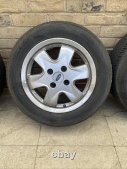 Ford Focus Mk1 Alloy Wheels Set Of Four Rare Style Optional Extra Good Tyres