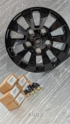 Sawtooth style alloy wheels. 18 inch set of 5 including 23 alloy wheel nuts