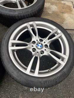Jantes alliage BMW Style 400M 18 pouces et pneus toutes saisons Continental
